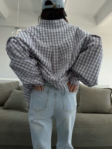 Светло-голубые джинсы-клеш