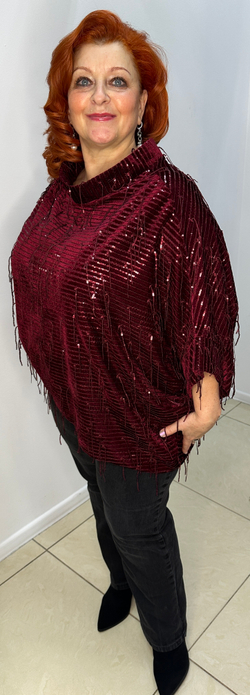 Нарядный блузон-туника с блестящими пайетками