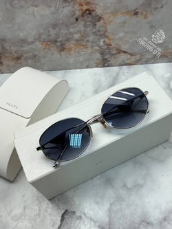 Солнечные очки Prada