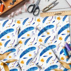 Ткань шифон синие перья и жёлтые цветы на белом фоне