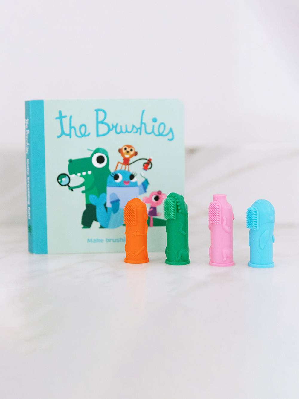 Набор Детская зубная щетка на пальчик The Brushies (0-4г) Чомпс и Книга со сказками