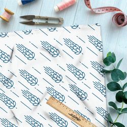 Ткань кулирная гладь падающие голубые злаки на белом фоне