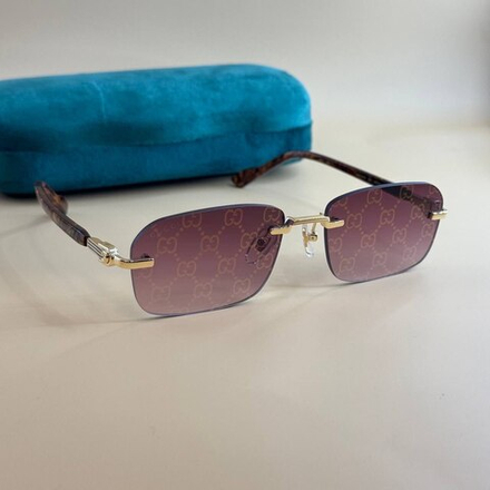 Солнцезащитные очки Gucci