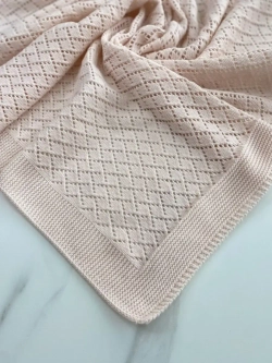 Вязаный плед для новорожденного