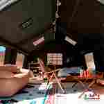 Пневмокаркасная всесезонная палатка «Тёплая Искра» 3,6×4,8×2,2 м — с печкой, из ПВХ, чёрная