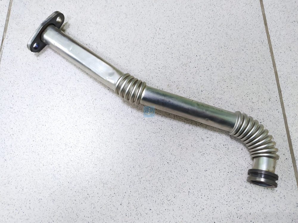 Патрубок слива масла с ТКР (⌀25, L-410, фланец 2отв. ⌀9 под шланг ⌀34) 650.1118340