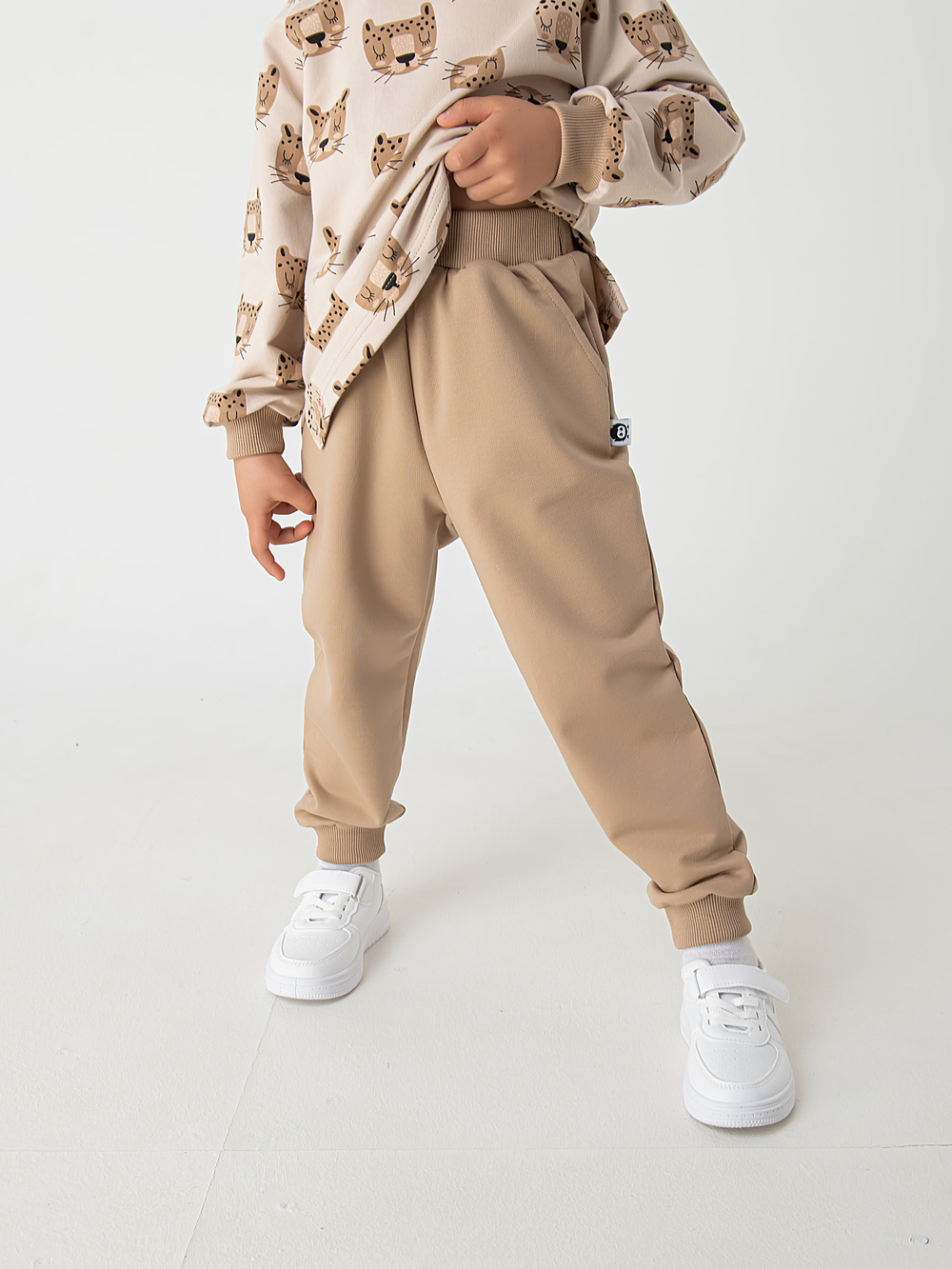 Костюм из трикотажа "Леопарды" бежевый