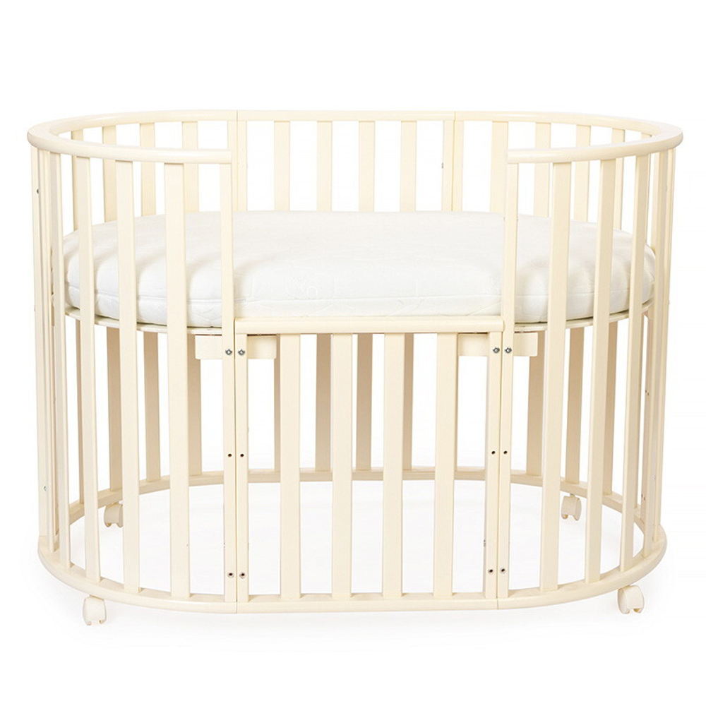 Кроватка-трансформер овальная Vikalex Лоди маятник на колёсах слоновая кость
