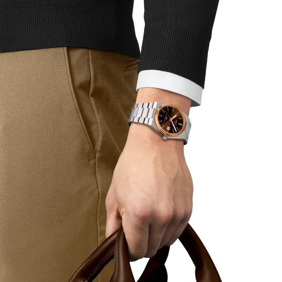 Tissot T931.407.41.291.00 мужские часы Tissot PRX Gold on the hand