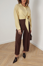 Брюки-баллоны с защипами на талии