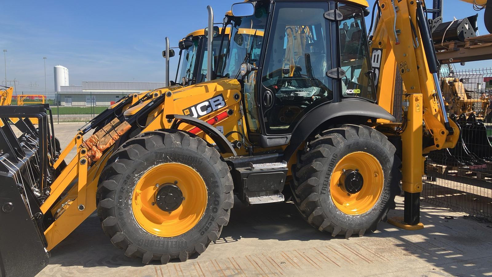 Экскаватор погрузчик JCB 4cx Англия оригинал