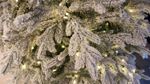 Заснеженная ель с гирляндой «Россо» теплый свет (Литая+пвх) от 1.2 до 2.4 м