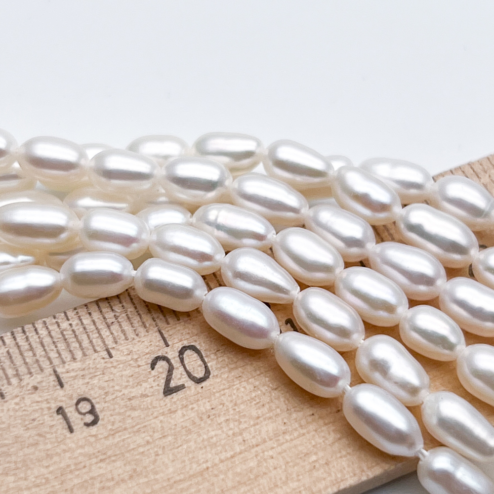 Жемчуг, размер около 6-8*4-4,3 мм, цена за отрезок 18 см (1/2 нити)