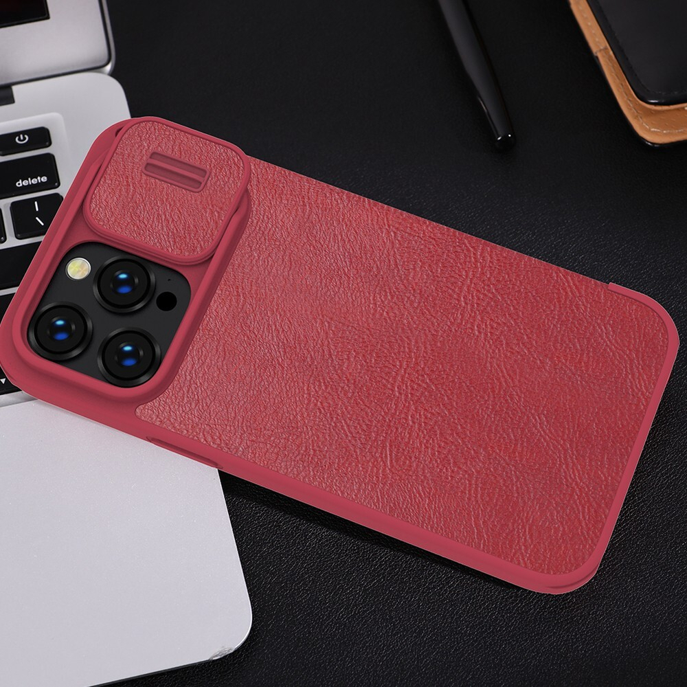 Кожаный чехол книжка красного цвета от Nillkin для iPhone 14 Pro, серия Qin Pro Leather с защитной шторкой для камеры