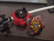 Волчок и лаунчер Legend Spriggan 7 Merge B86 от Takara Tomy