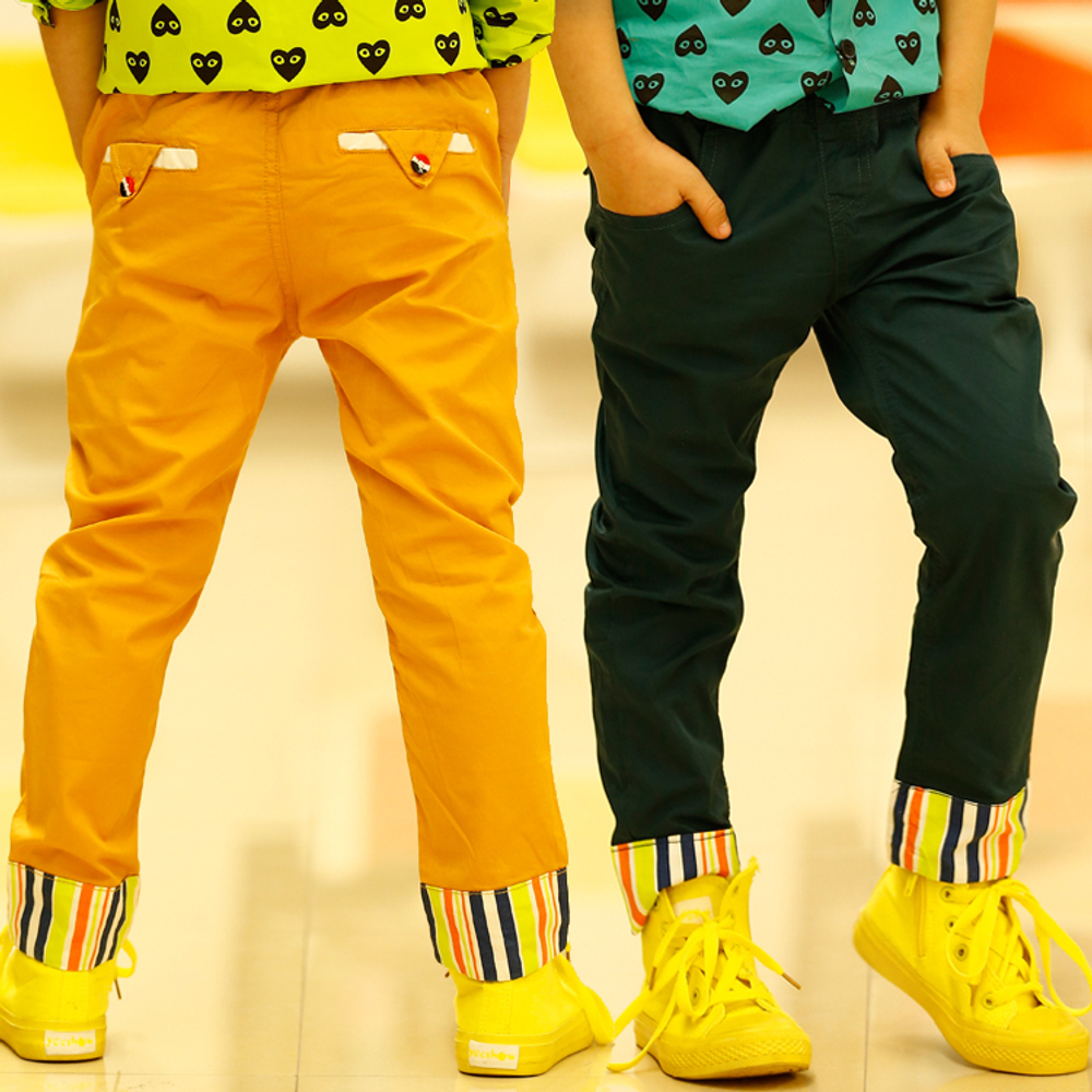 Брюки однотонные с отворотами в полоску