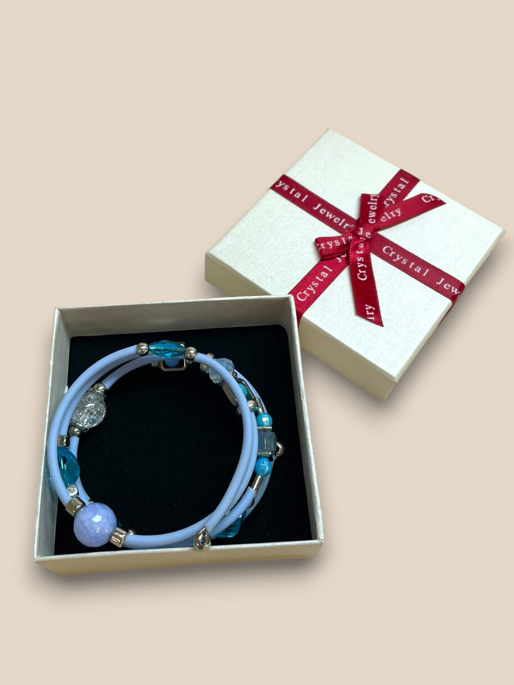 Браслет с бусинами гибкий голубой