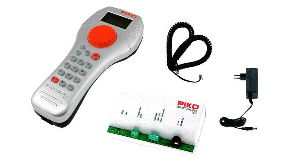 Цифровой набор "Грузовой + Пассажирский составы"  PIKO SmartControl light (Piko 59013)