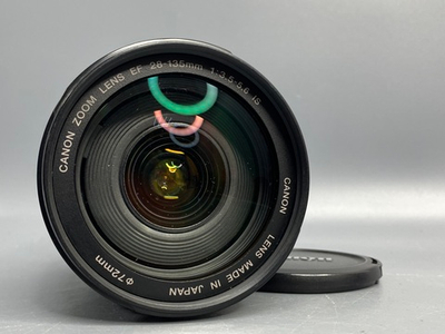 Canon EF 28-135mm 3.5-5.6 IS USM царапка на передней линзе
