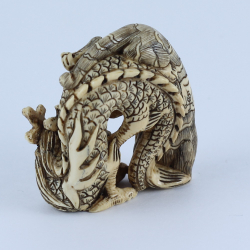 Нэцкэ Нэцкэ Дракон и тигр (мамонт)