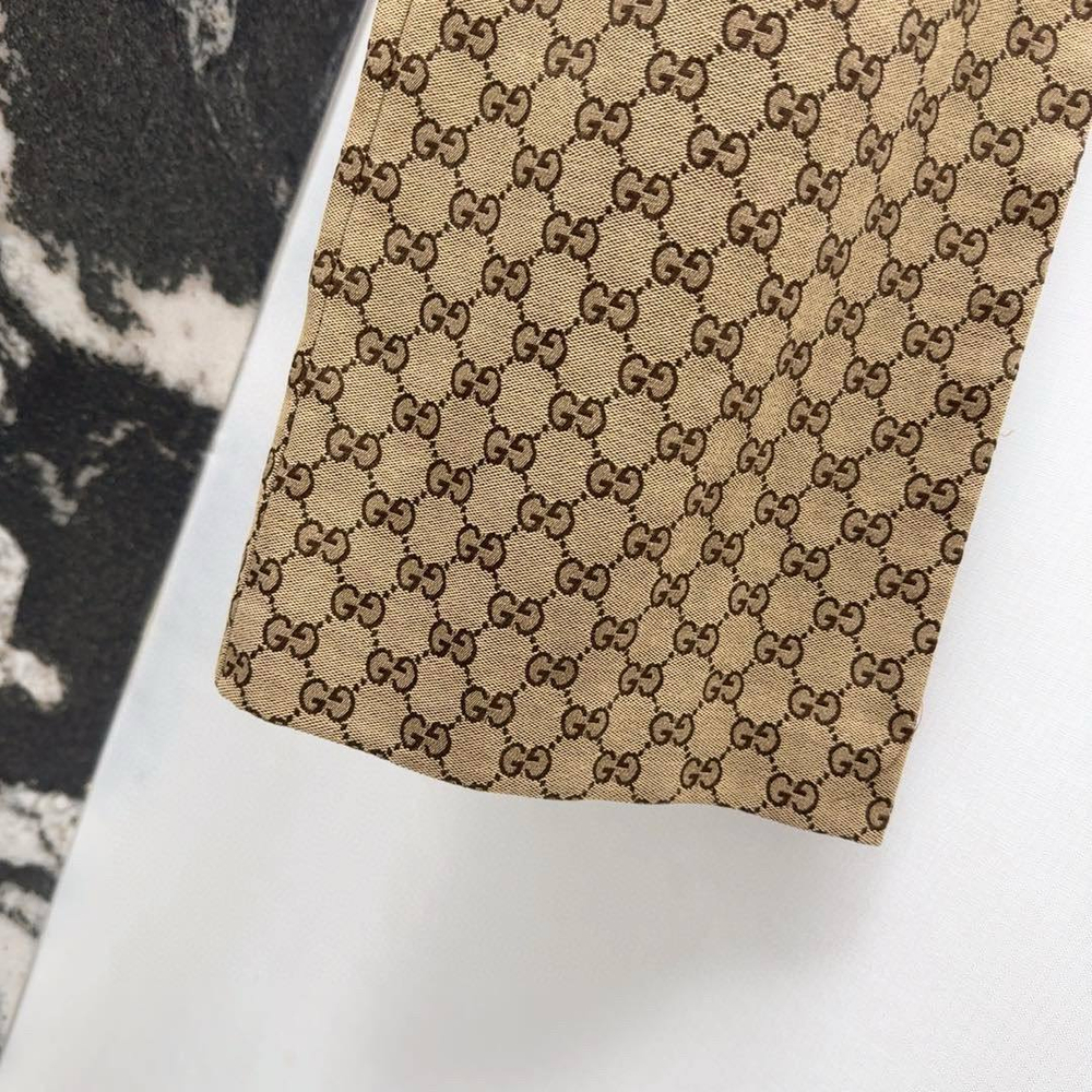 Джинсы Gucci