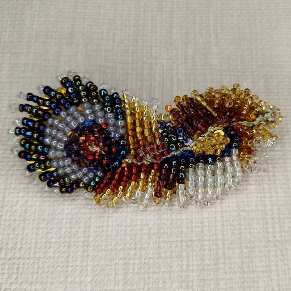 Авторская брошь Пёрышки