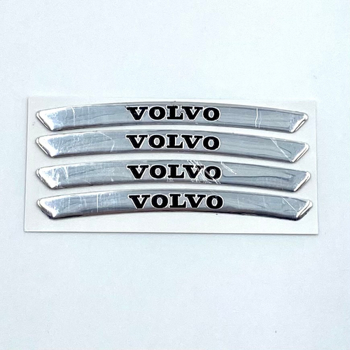 Наклейки Volvo серебристые объемные пластик (шильдик Вольво, 9х0,8см). Серебристые с черной надписью - 4шт в комплекте