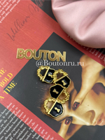 Пуговицы Скиап. золотистые с черной эмалью в виде замка