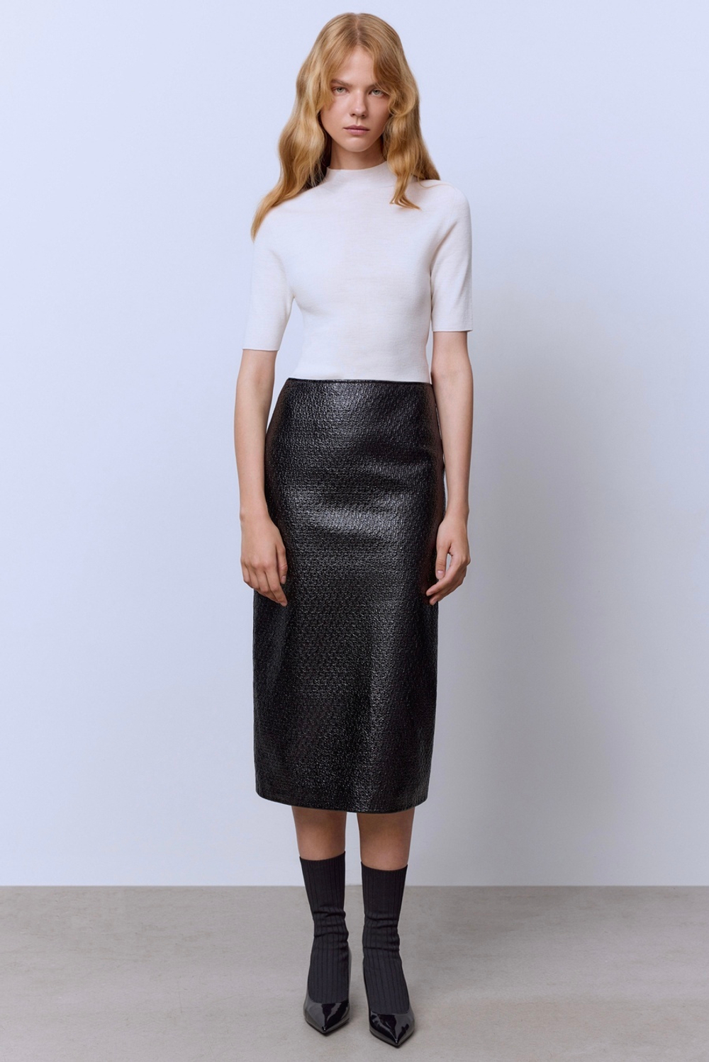 Юбка из лакового твида