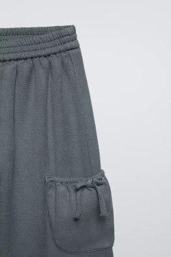 ZARA БРЮКИ ИЗ СТРУЯЩЕЙСЯ ТКАНИ С БАНТАМИ, СЕРЫЙ