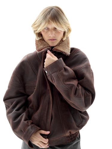 Коричневая кожаная оверсайз дубленка с отложным воротником