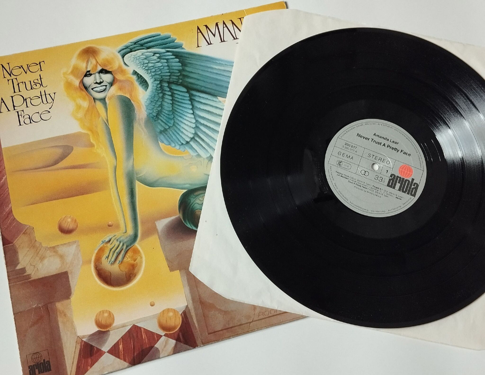 Винтажная виниловая пластинка LP Amanda Lear Never Trust A Pretty Face (Germany 1979) Black Holes