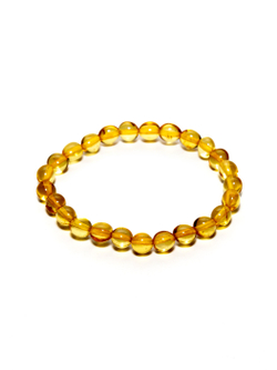 Детский браслет из цельного янтаря "Морская галька". Браслет для детей из натуральных камней