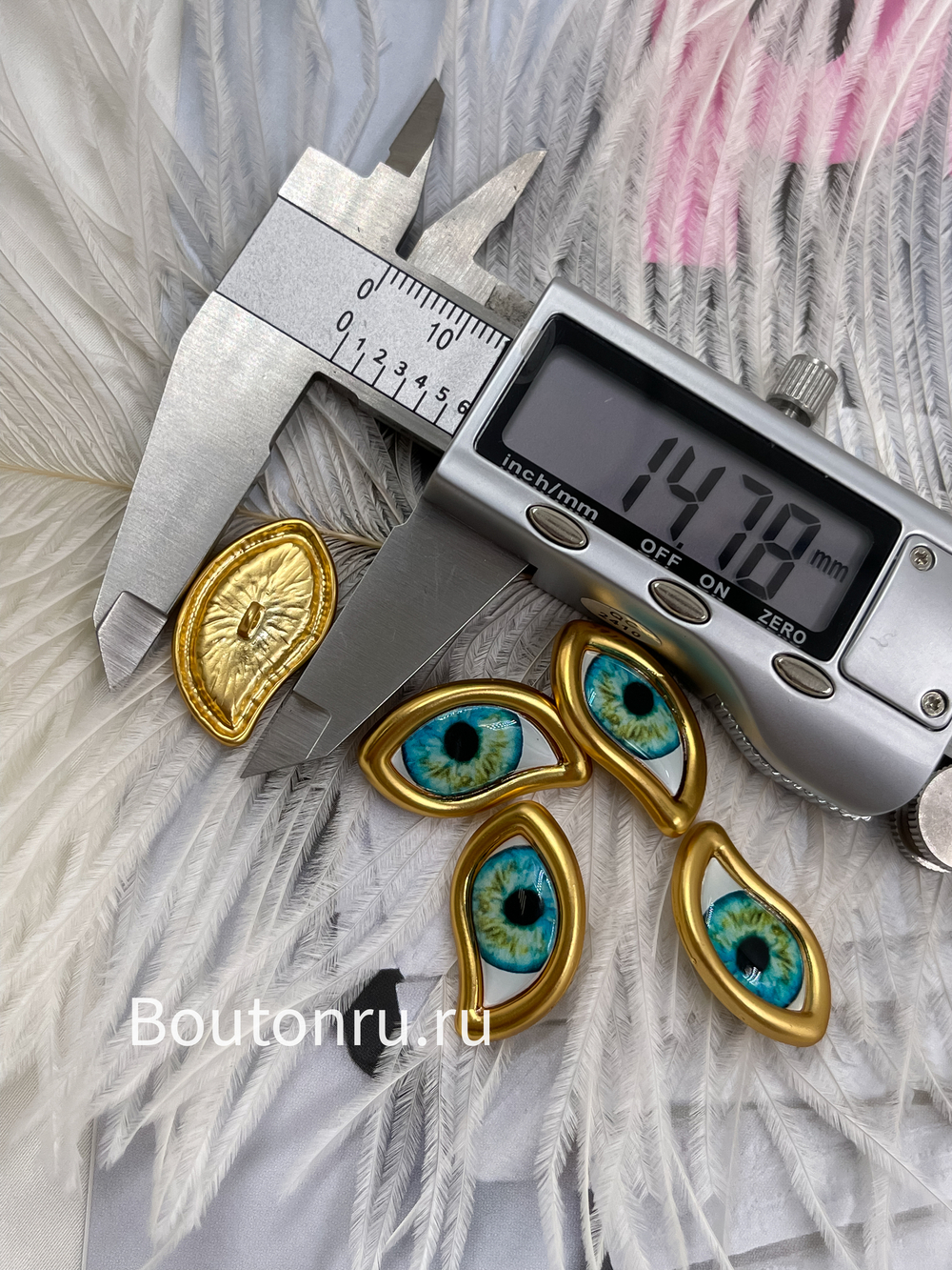 Пуговицы золотистые Скиапар. с эмалью "Глаз"