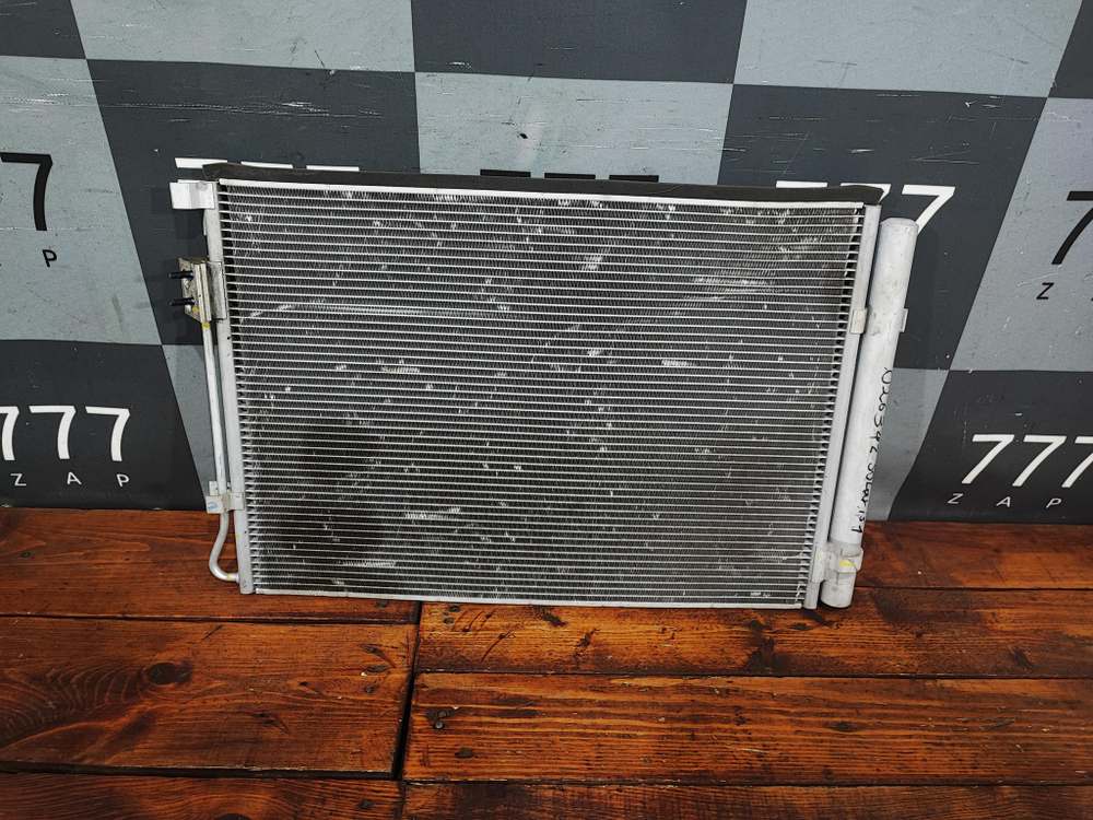 Радиатор кондиционера Solaris 1 / Rio 3 Б/У Оригинал 976061R000