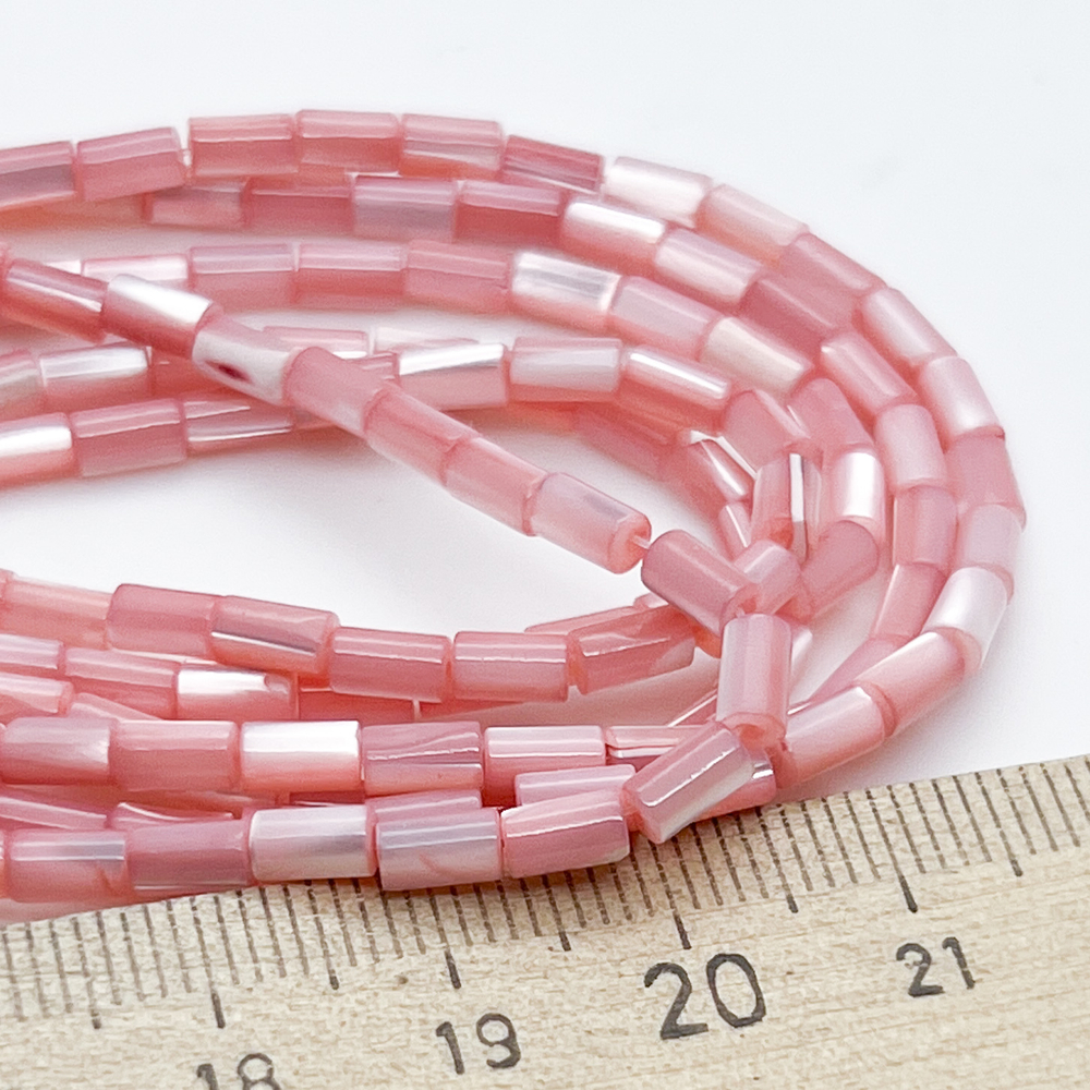 Перламутр тонированный, цвет розовый, размер около 5*2,8 мм, цена за отрезок 36-37 шт (1/2 нити)