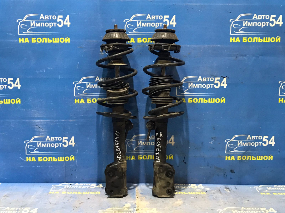 Стойка передняя левая Honda FIT 2001-2007