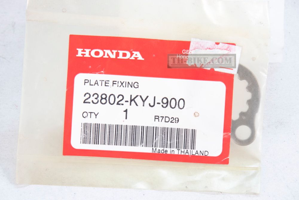 23802-KYJ-900. PLATE, FIXING