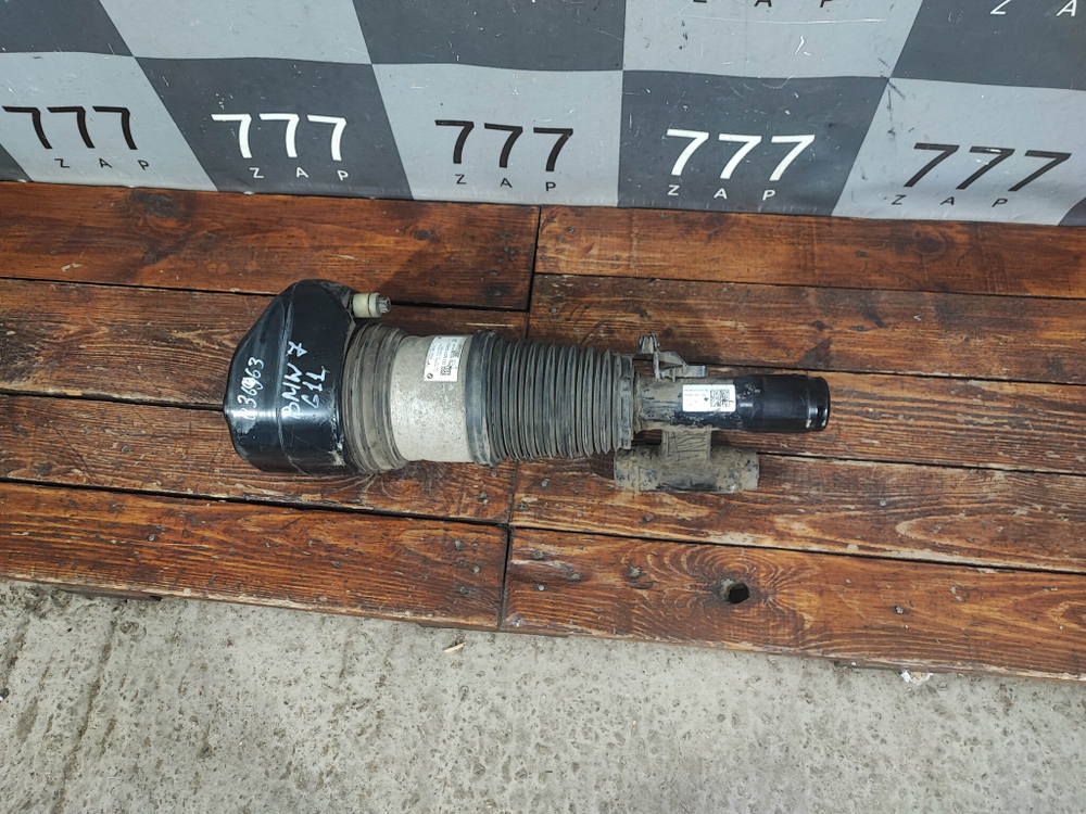 Амортизатор передний левый BMW 7-Series (G11) 15-22 Б/У Оригинал 77687755905