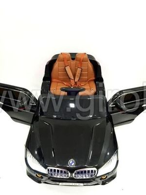 Детский электромобиль River Toys BMW E002KX черный