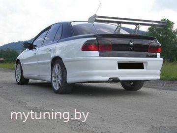 Задний бампер Opel Omega