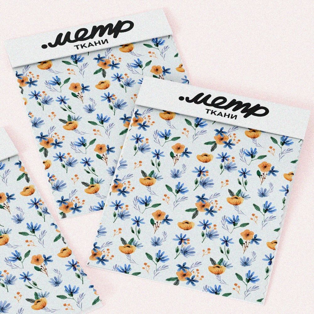 Ткань сатин оранжевые цветочки с голубыми листочками