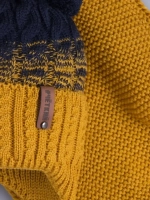 Шапка вязаная для мальчика на завязках и снуд