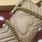 Стеганая мини-сумка Gucci GG Marmont бежевый