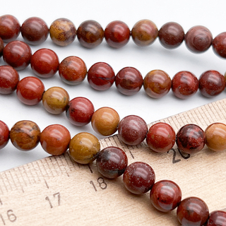 Яшма красно-желтая бусины, диаметр около 6,2-6,5 мм, цена за 29-30 шт (1/2 нити)