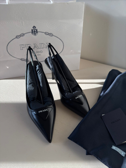 Слингбэки Prada