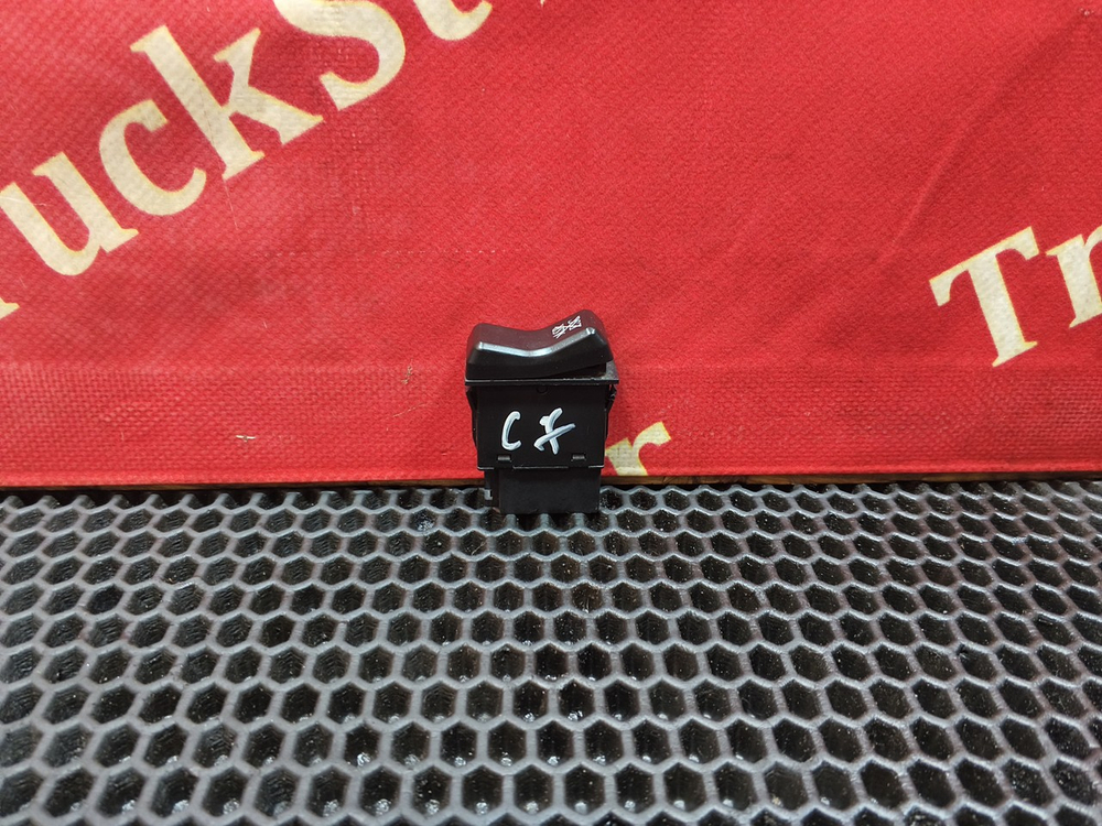 Кнопка системы ASR/ESC