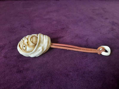 Дарума (к счастью), орех Тугуа