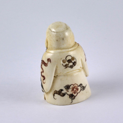 Нэцкэ Ребенок Карако с хлебом