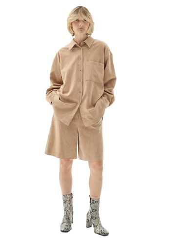 Бежевые шорты из эко-замши